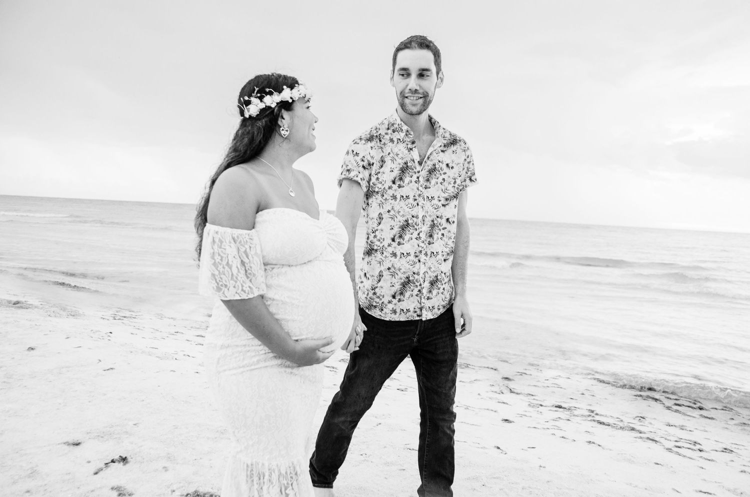 Maternity photo with husband holding hands