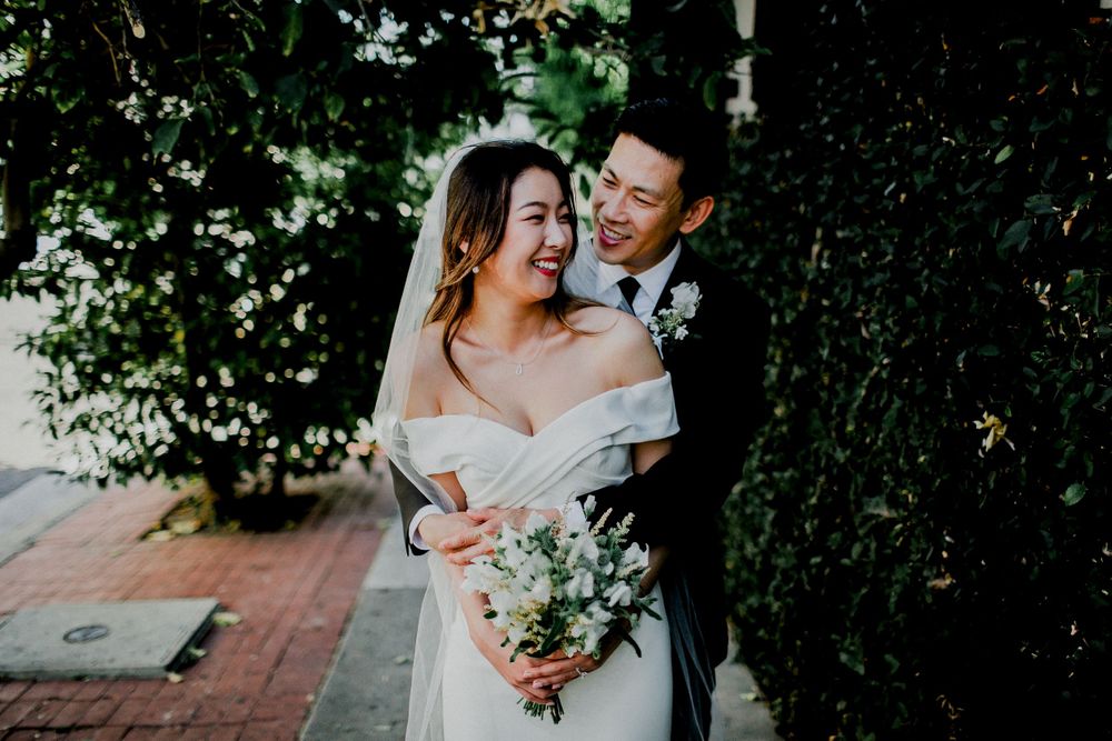 bride and groom looking at each other