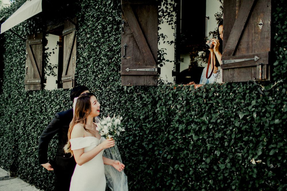 bride and groom greeting friends