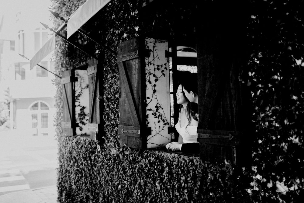 black and white of bride and groom intimate candid