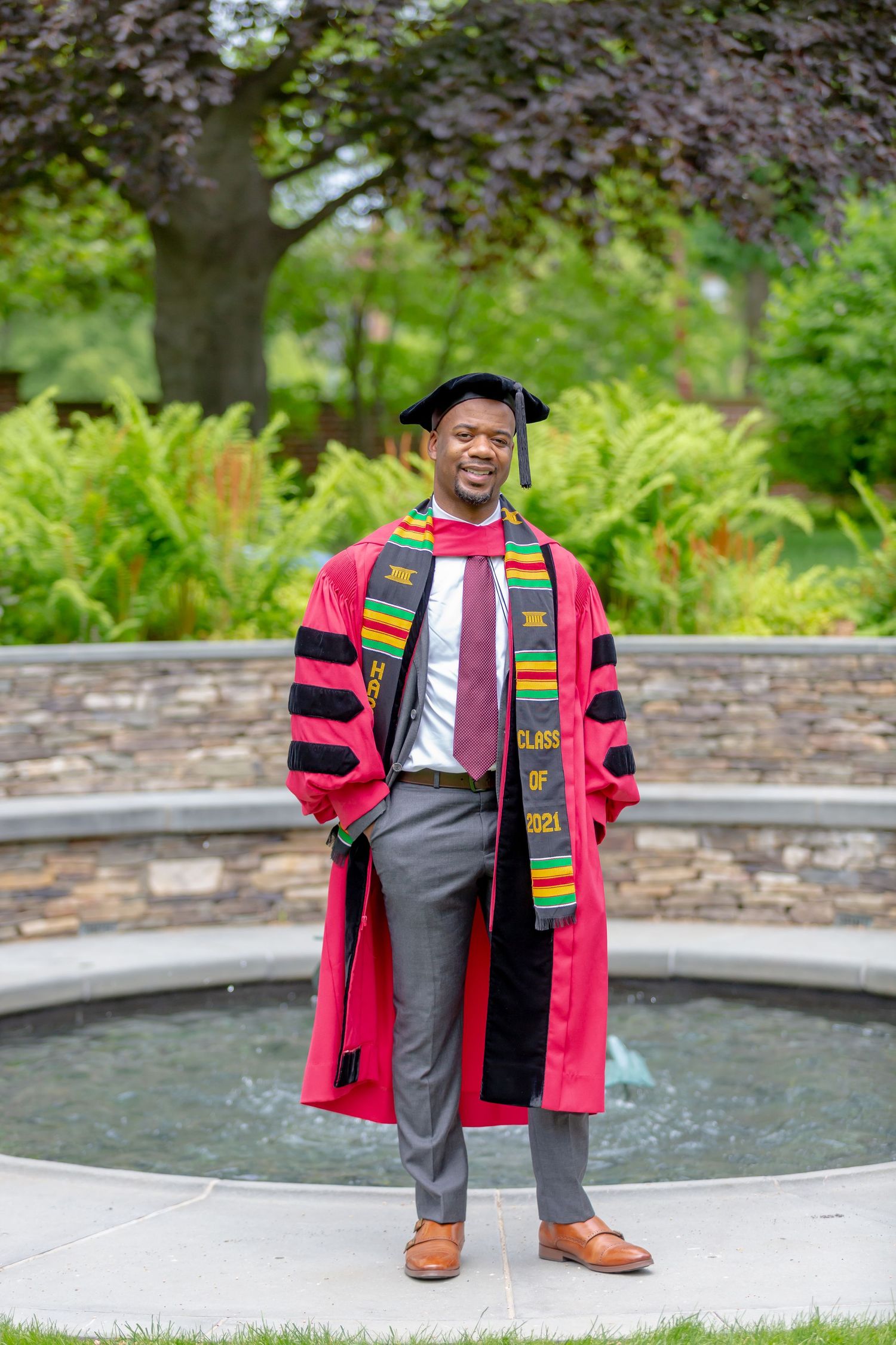 Young_professional_man_posing _for_graduation_pictures