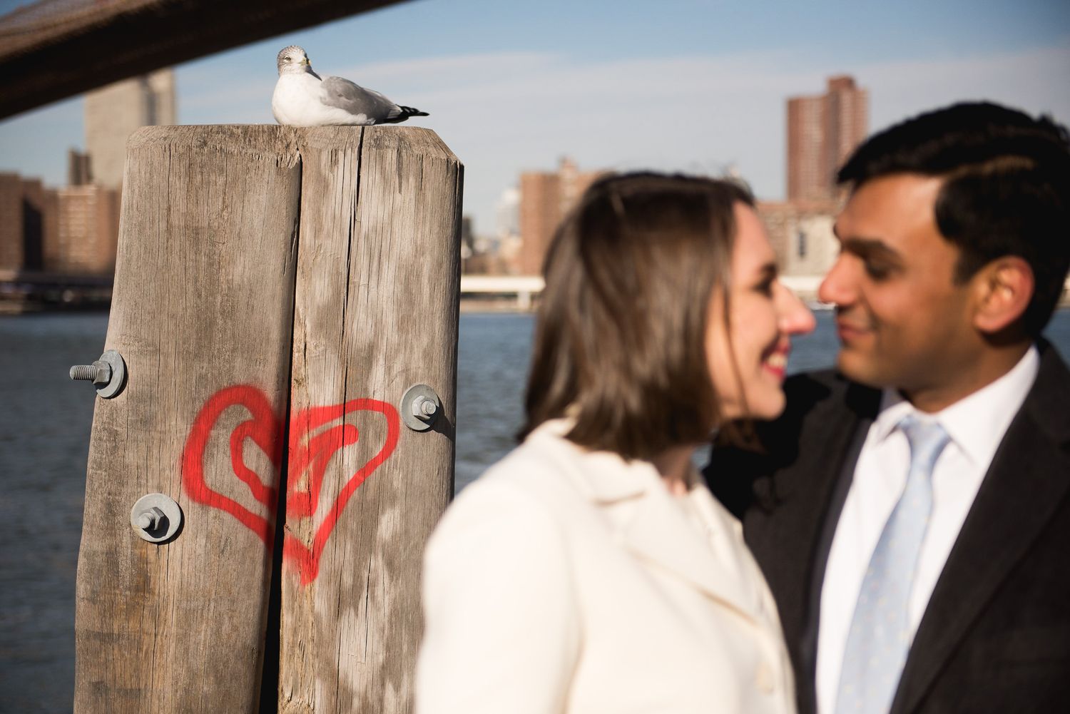 bride and groom heart graffiti seagull Brooklyn dumbo ny winter wedding
