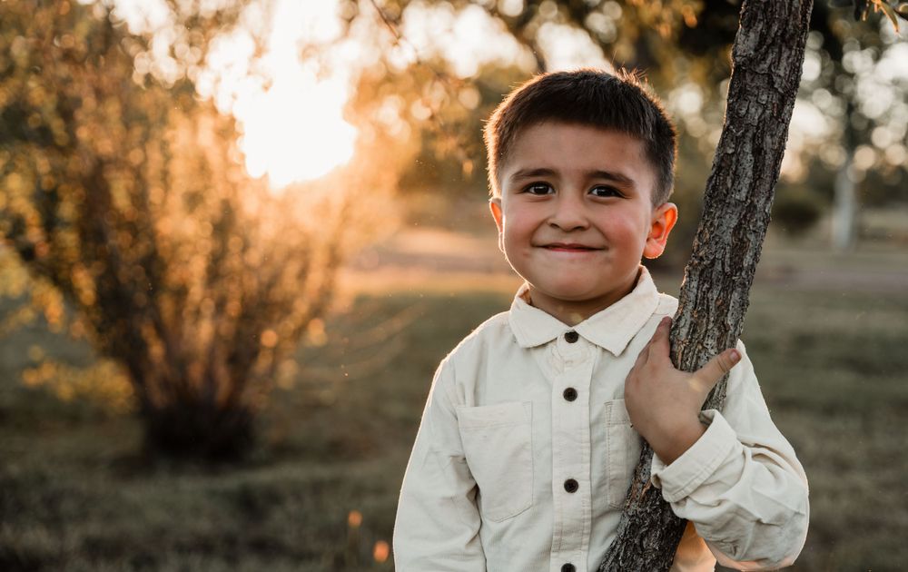 Natural lifestyle family photography session in warm autumn evening light.