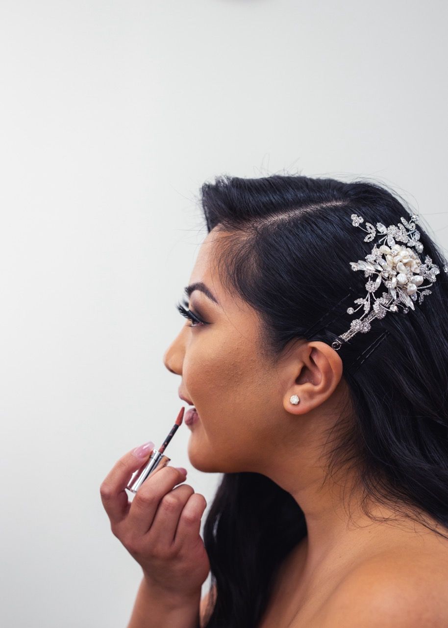 Bride getting ready at a Snohomish wedding venue. Warm lifestyle photography by Tim Neal.