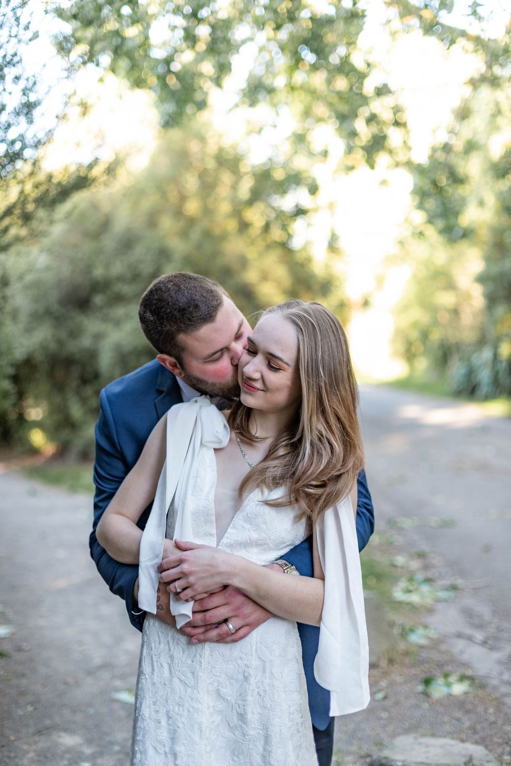 bride and groom embracing
