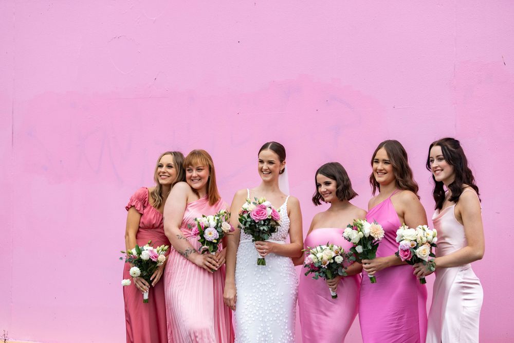 bridesmaid portrait holding their bouquets