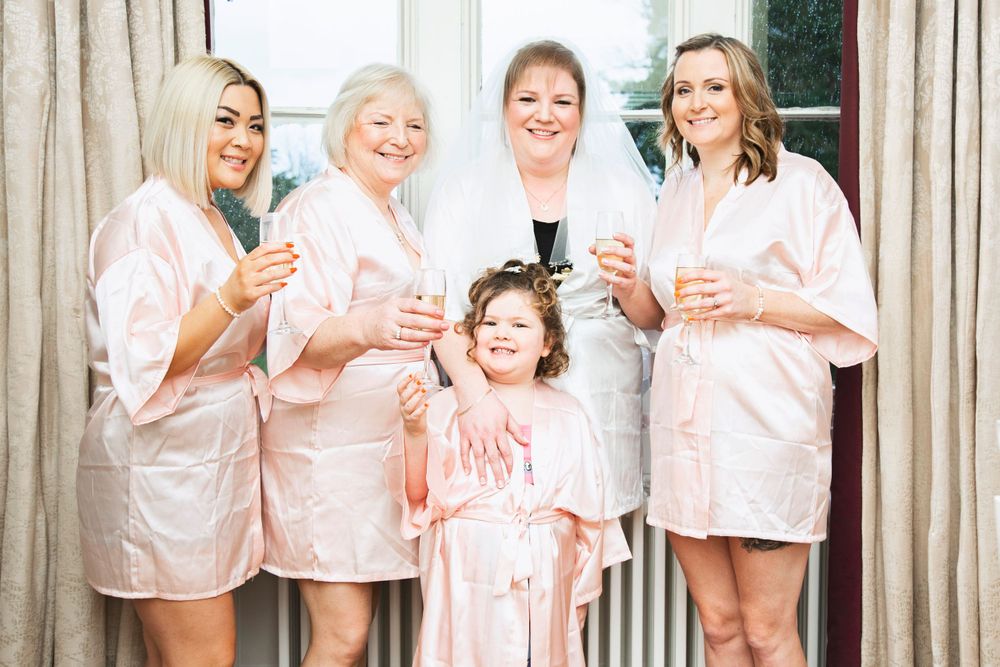A bride and her bridal party at Shendish Manor Hotel