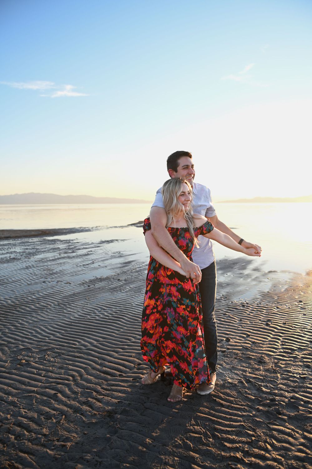 Photograph of an engaged couple on the beach near Salt Lake City, Utah