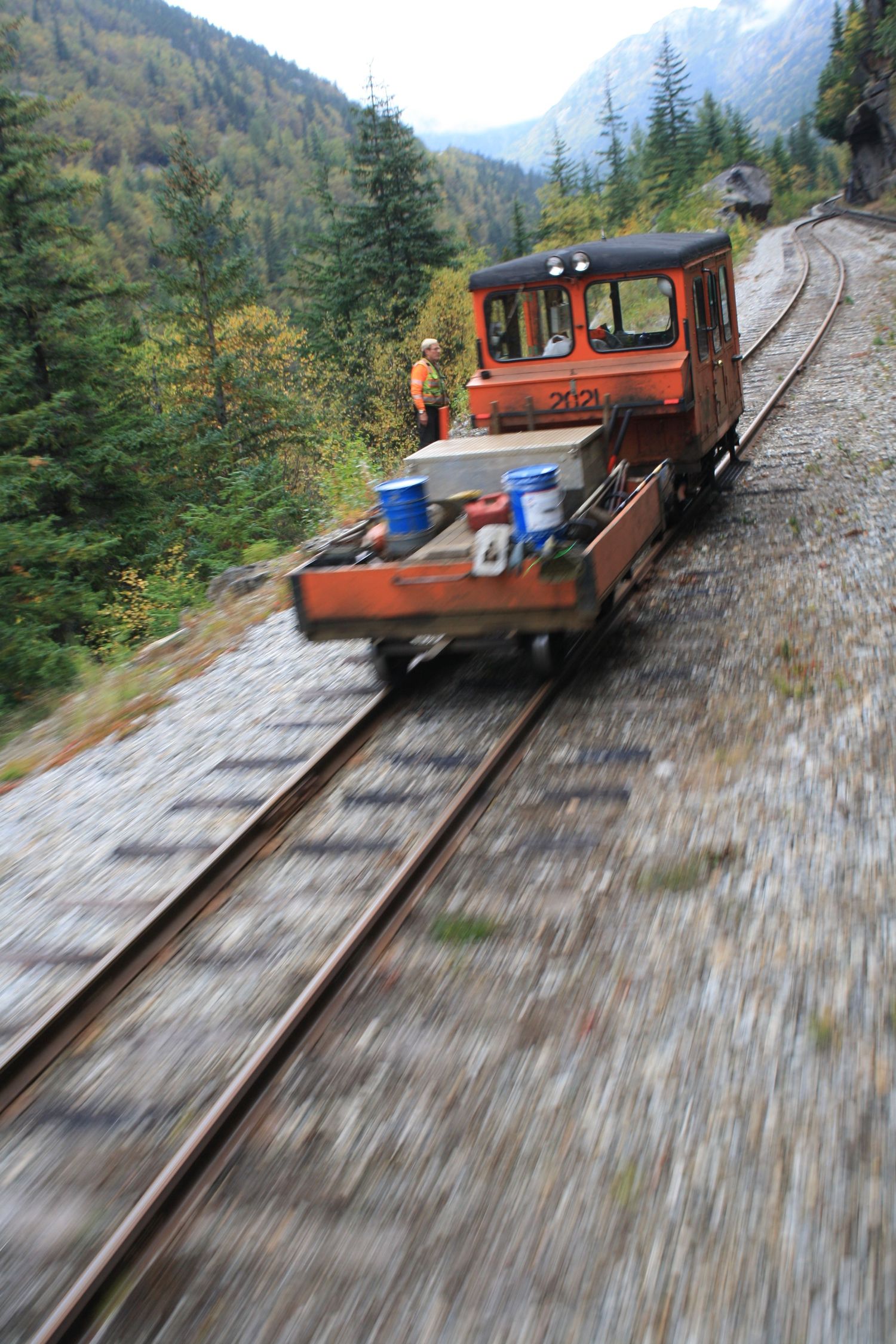 Blurred image of a trainman working on a line, Alaska
