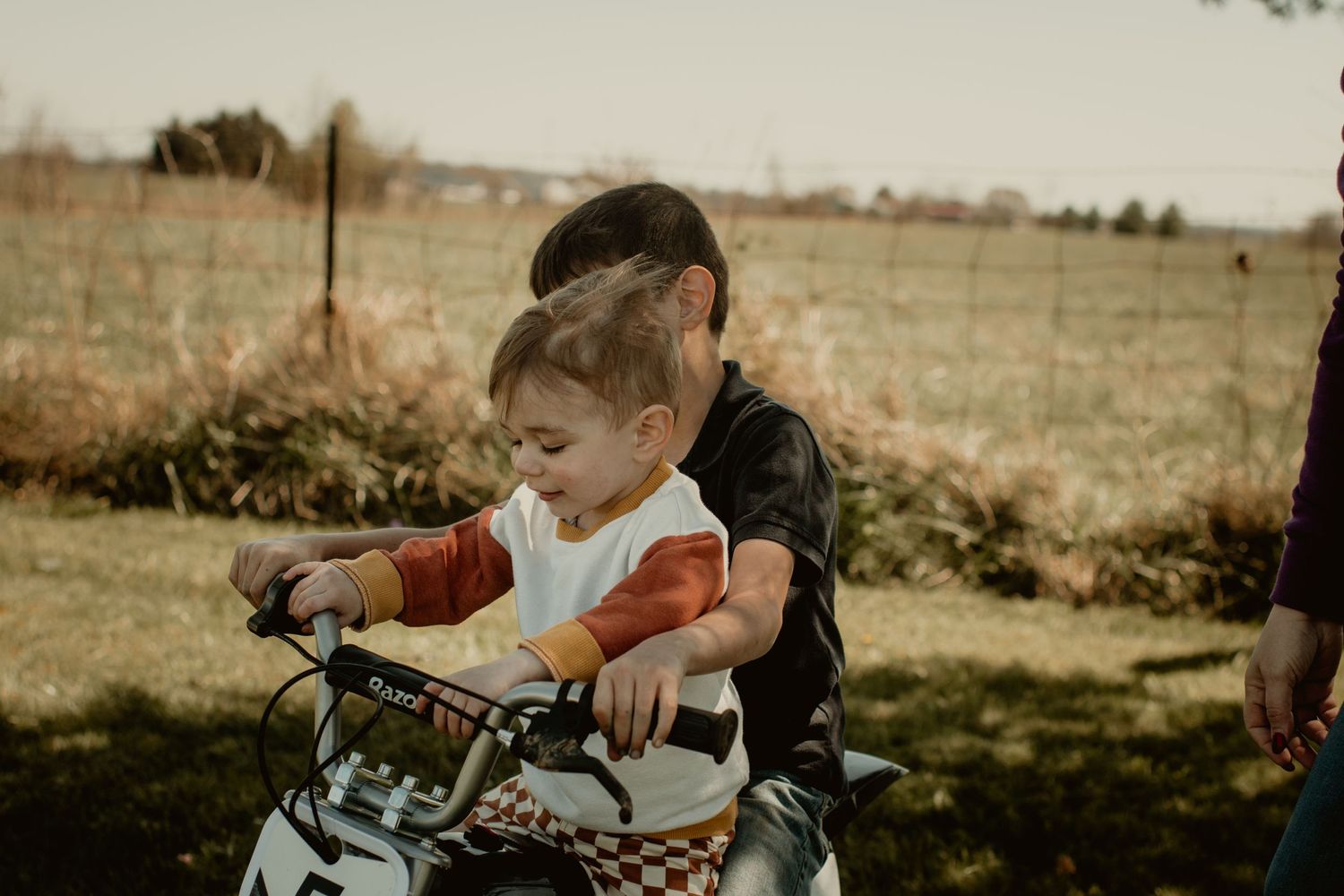 Little boys on a dirtbike