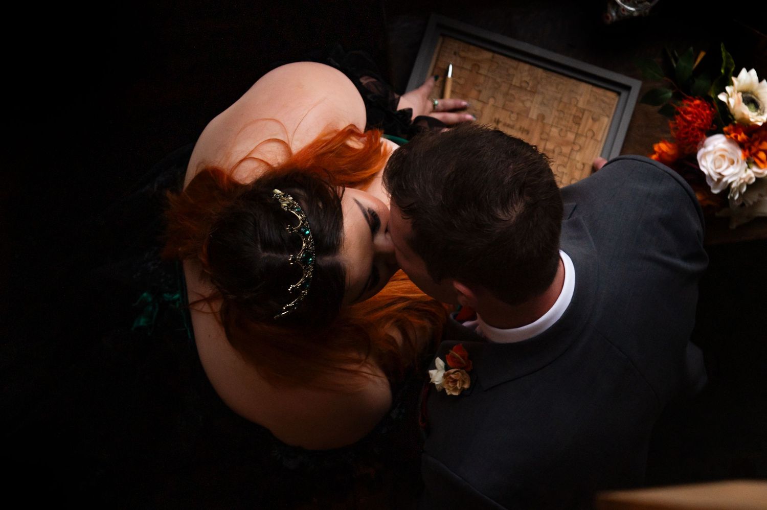 Dark and moody reception photos showing couples dancing at wedding celebration.