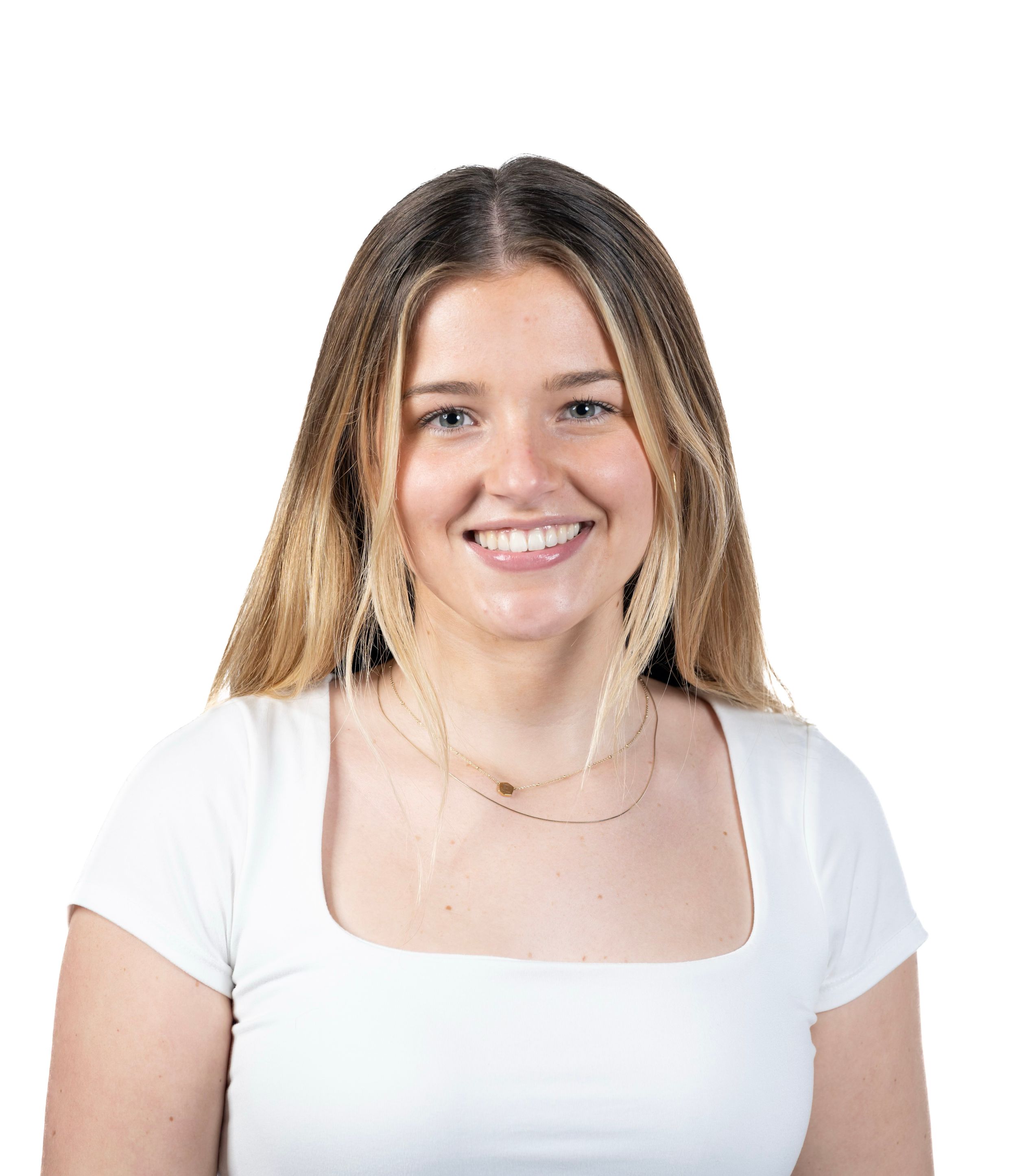 Professional headshot of person in white shirt against neutral background.