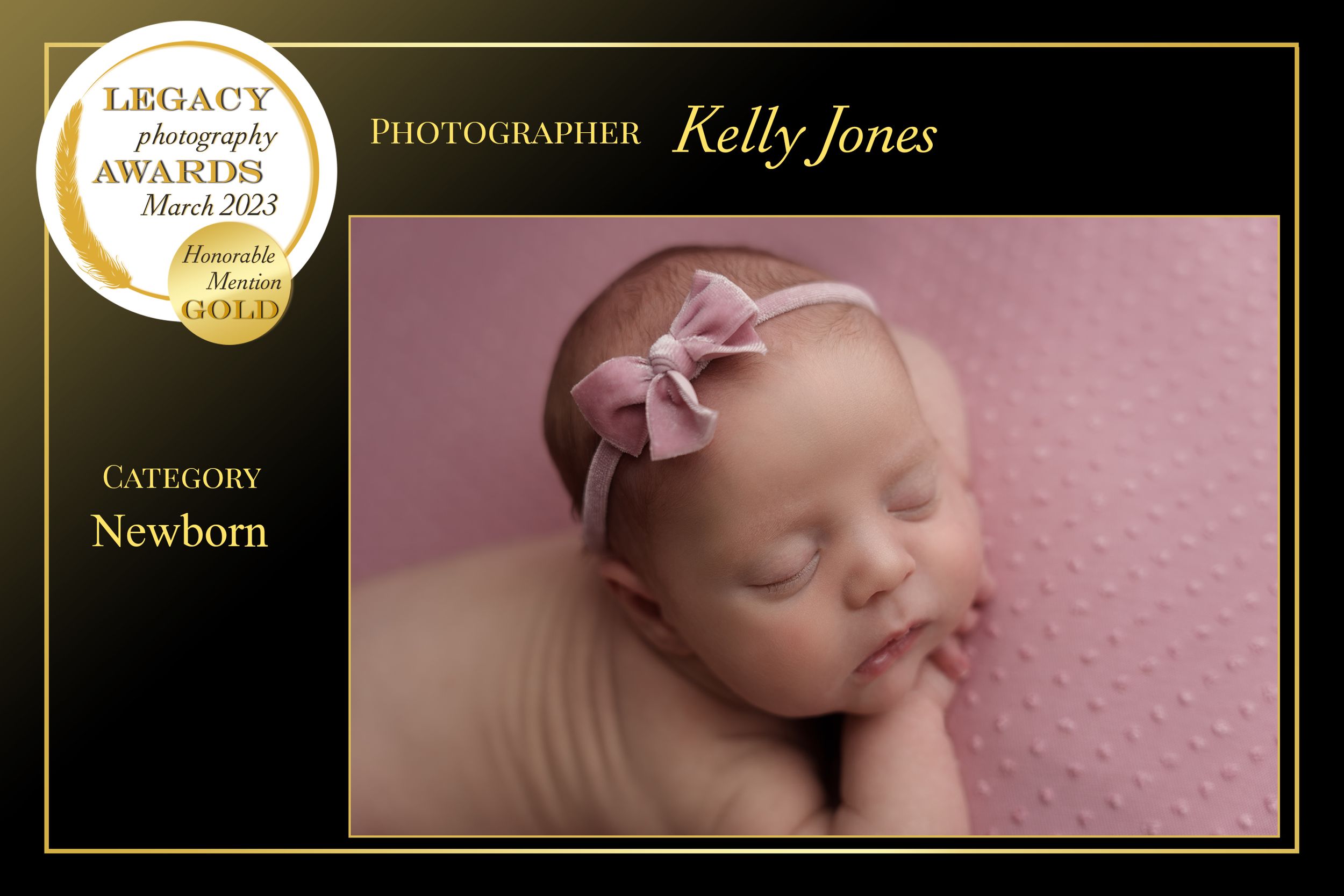 Award-winning newborn photography of sleeping baby with pink bow on pink background.