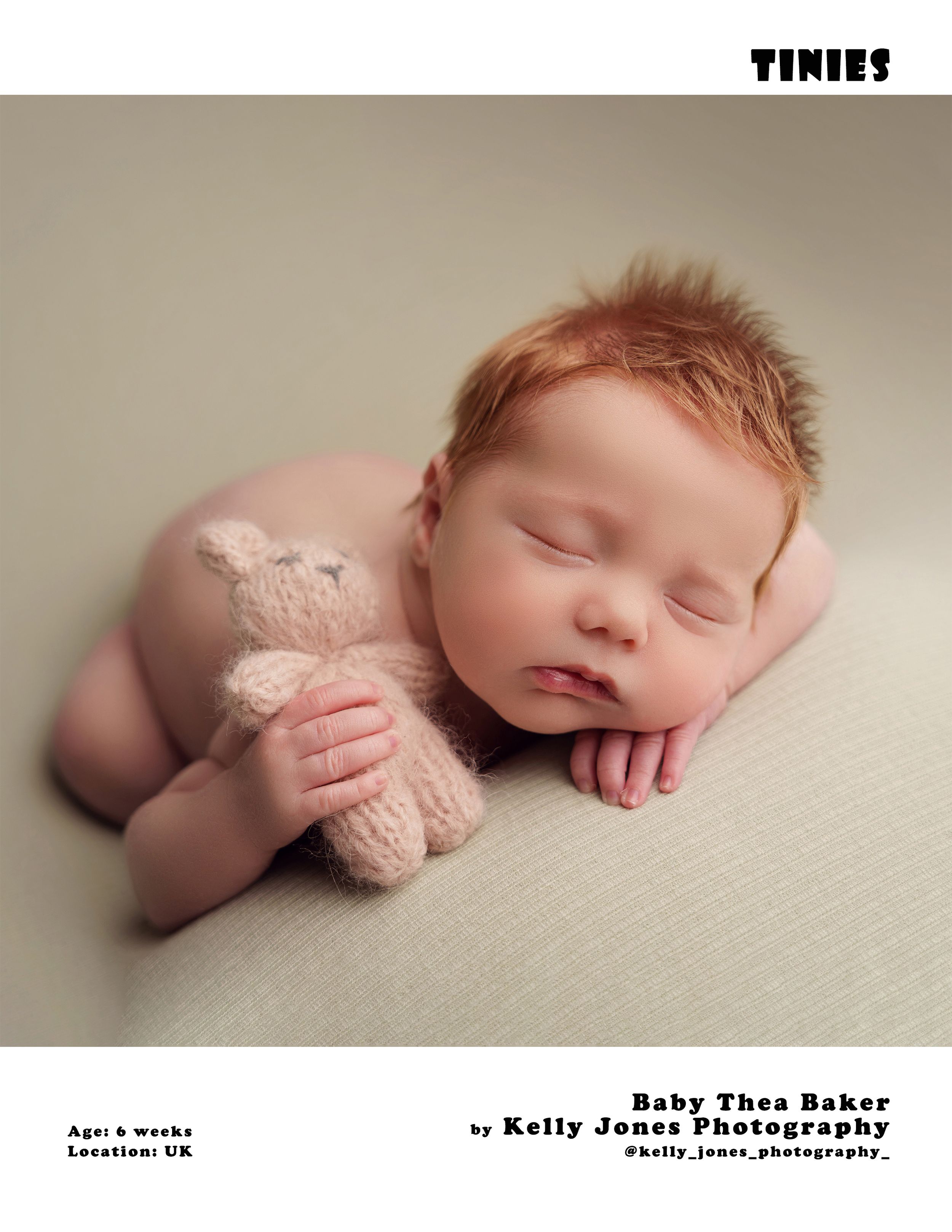 Peaceful sleeping newborn cuddling small plush toy on neutral fabric backdrop.