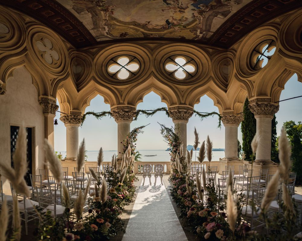 Stunning wedding venue with gothic arches and ocean views.