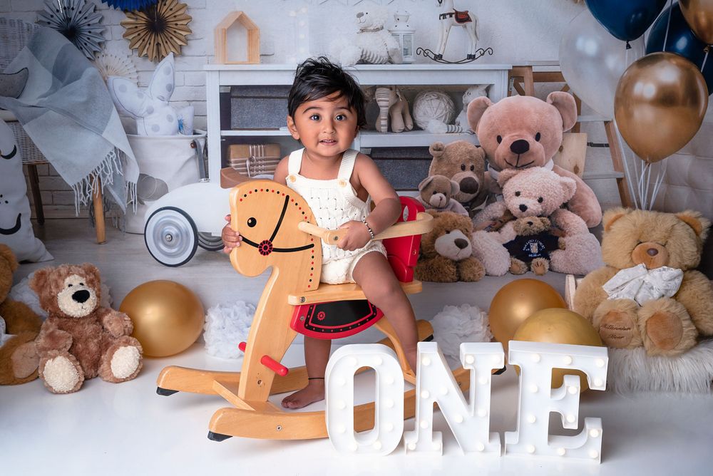 baby milestone photography with rocking horse West Midlands