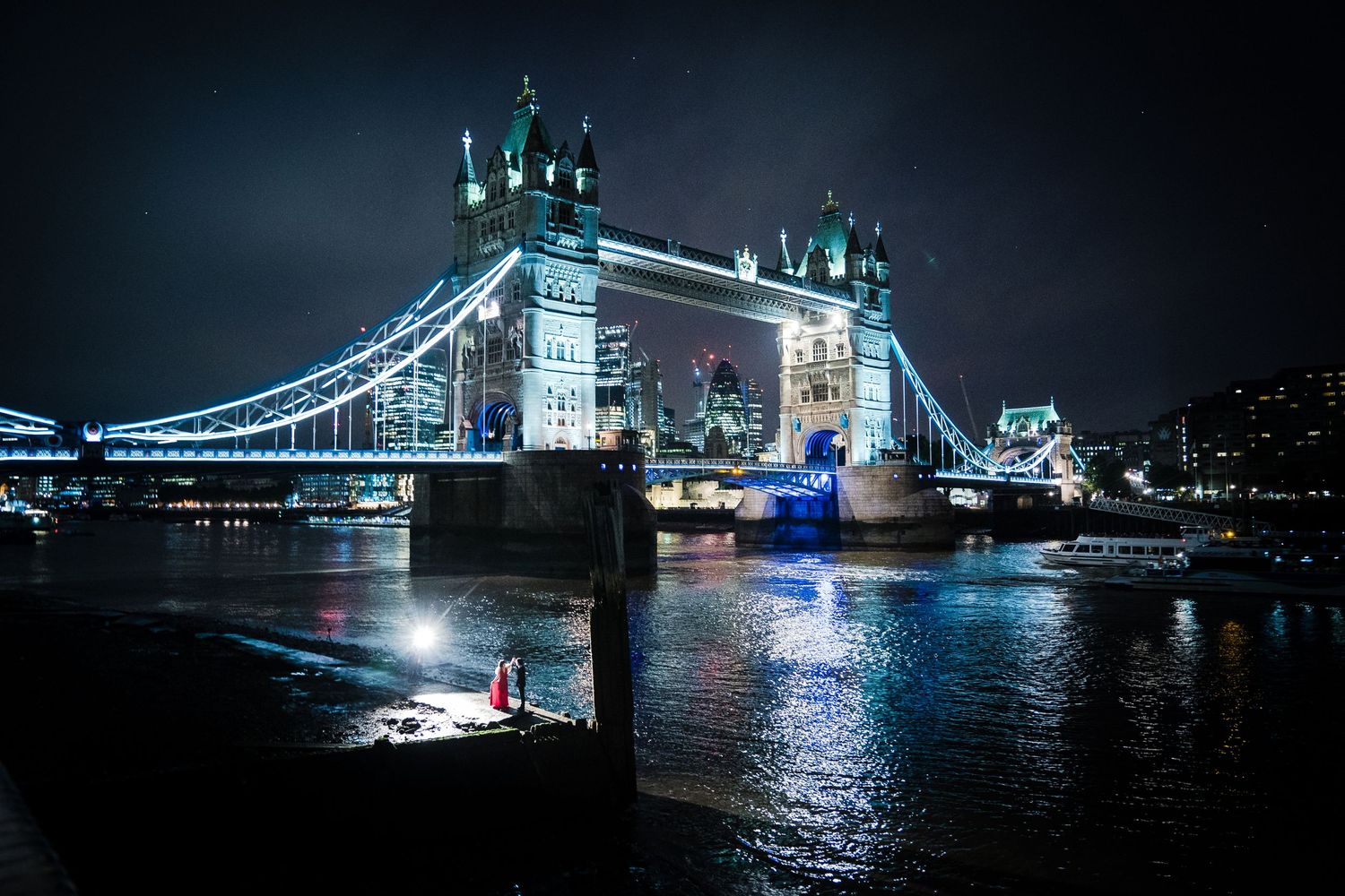 London Pre-wedding photography - couple by Tower Bridge at night