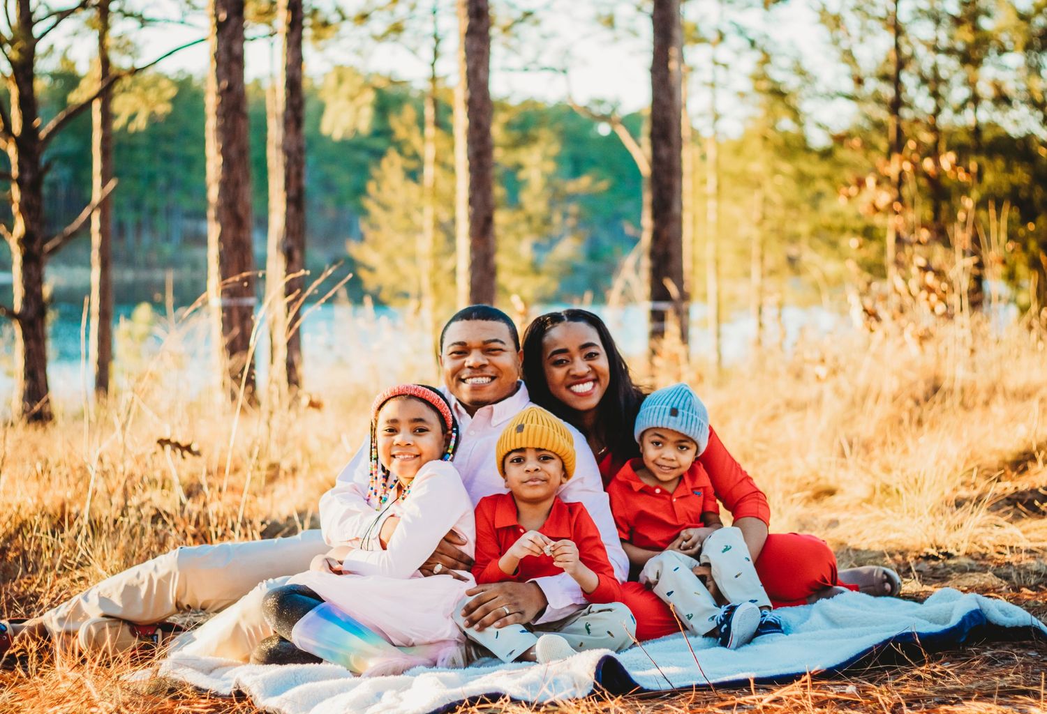 Sunny and Bright family photos beside a lake in New Haven, CT