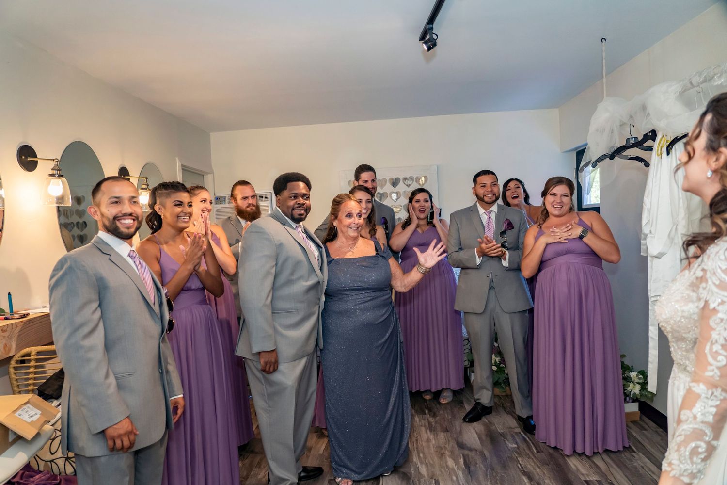 Bridal Party seeing the bride fully dressed for the first time