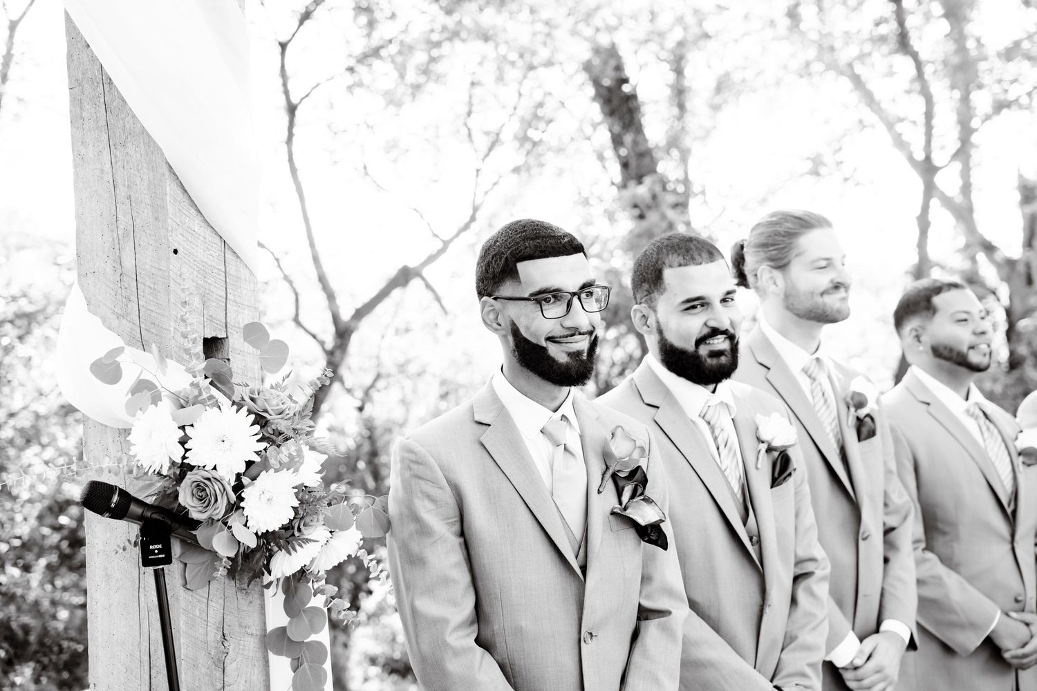 Groom at the altar for the wedding ceremony - Blue Heron Barn - black and white