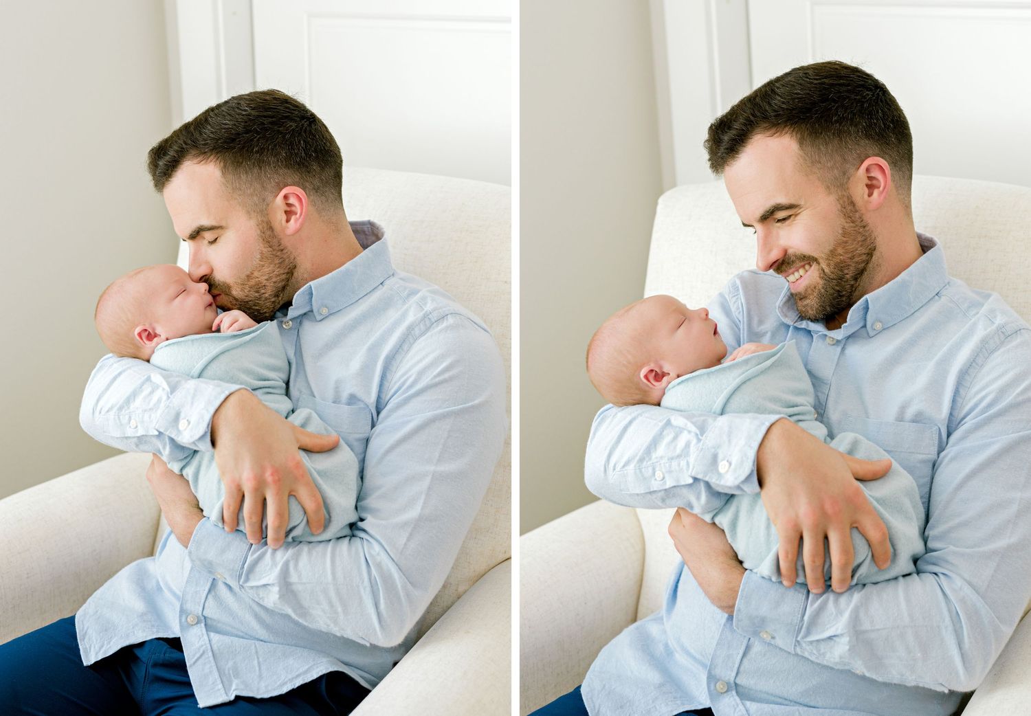 A tender moment between a newborn baby wearing light blue and an adult in a blue button-down shirt.