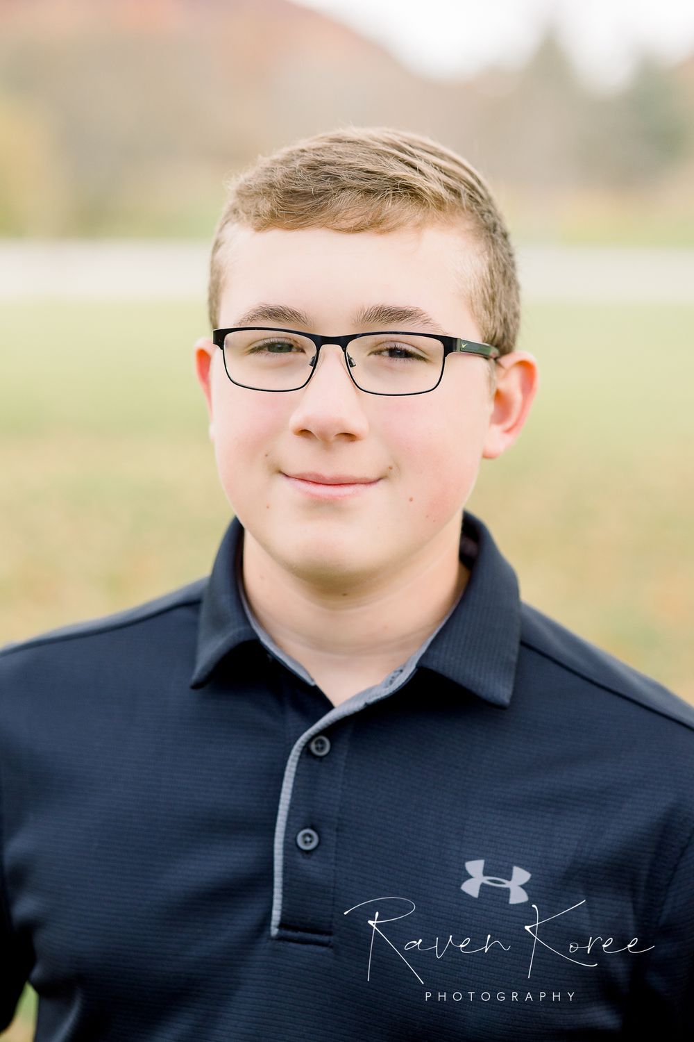 High school student posing in a field in Knoxville Tennessee