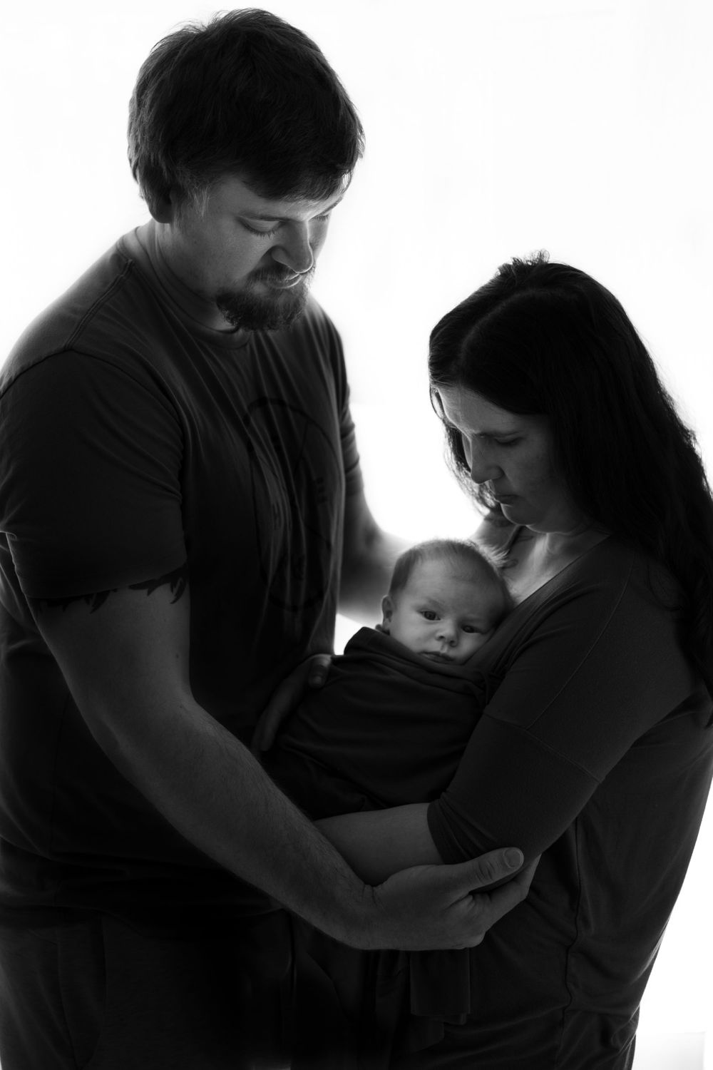 Black and white photography during newborn photo session in Mooresville NC