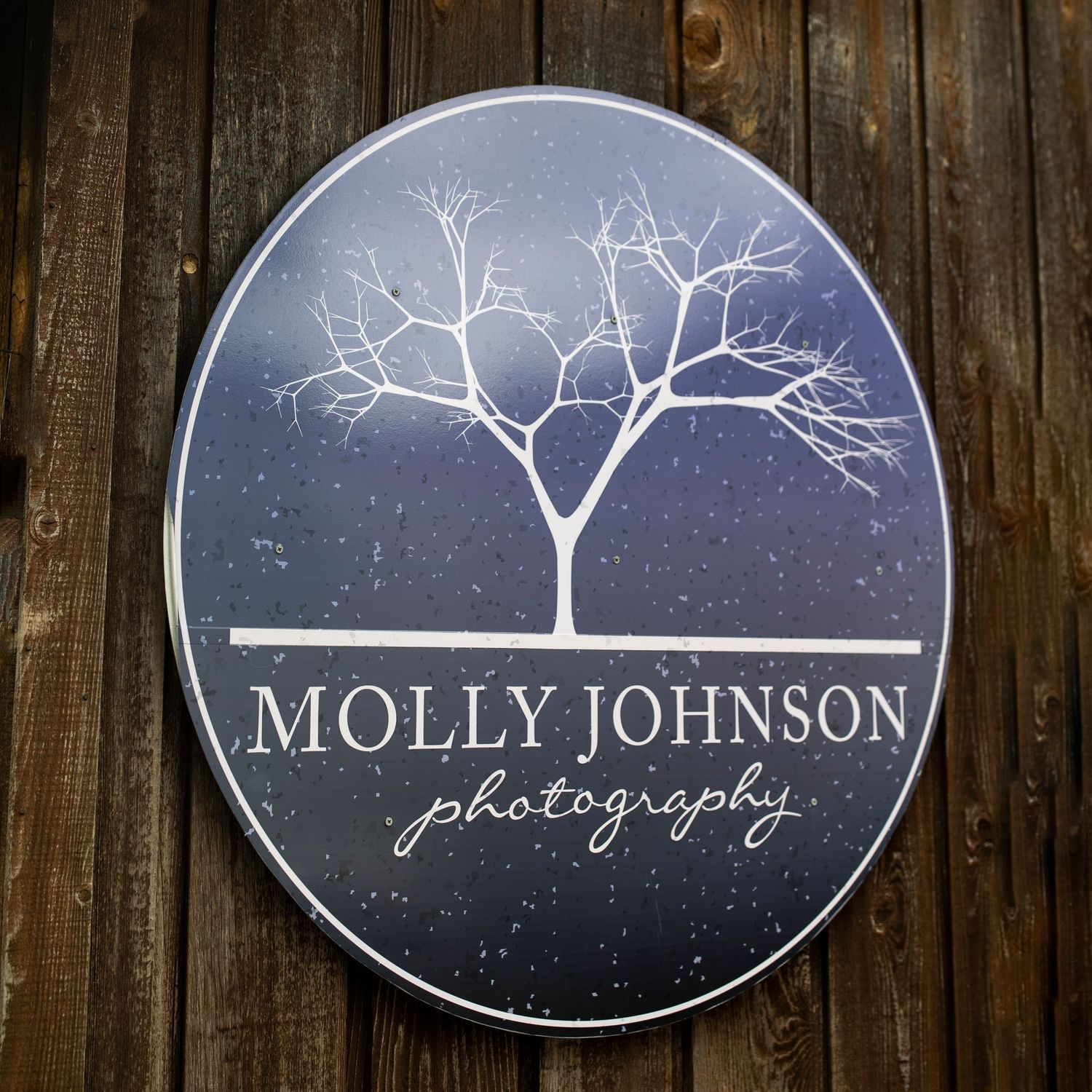 outdoor view of molly johnson photography studio sign