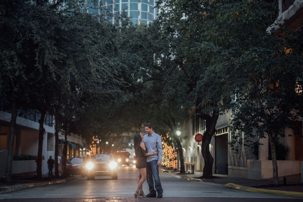 Couple embracing each other at dusk during an engagement session in Coconut grove Florida