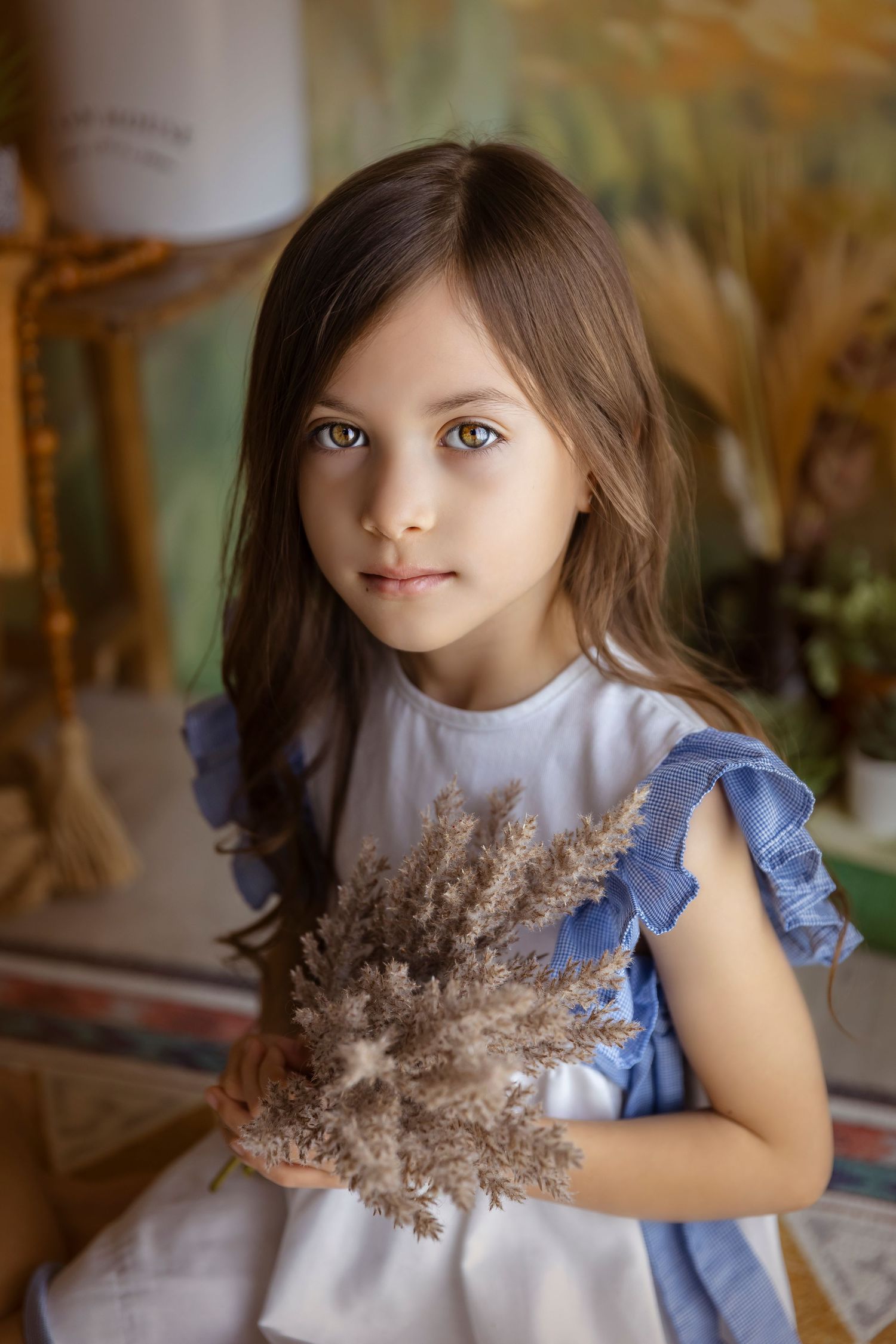 little girl posing with dry plants vintage style detres photography natural light photography
