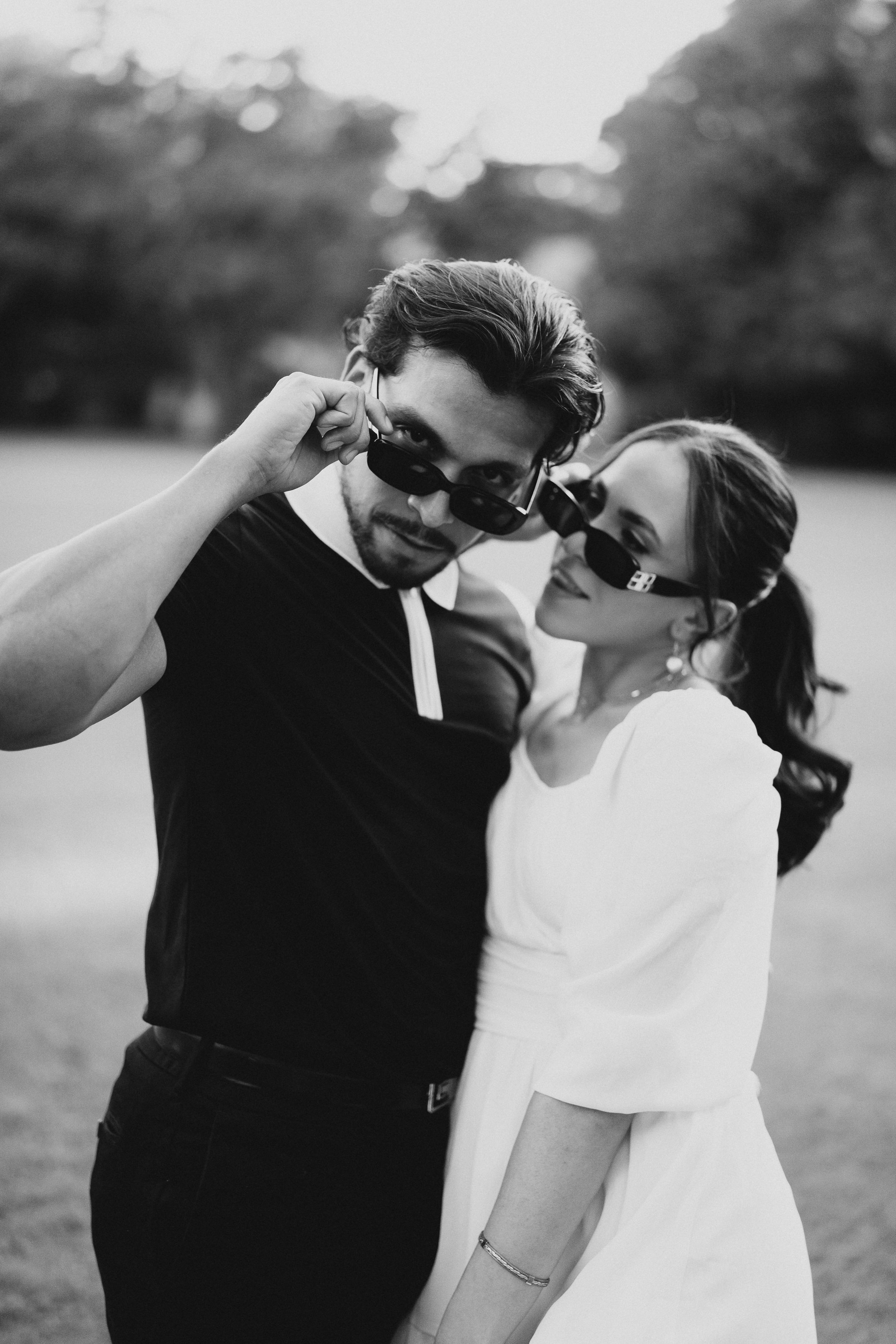 cool couple in sunglasses. outside engagement photoshoot. highland park texas engagement photos. alex marie photography.