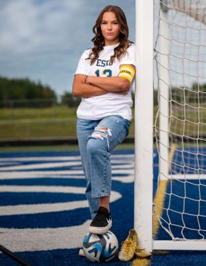 Duluth Minnesota area senior grad photographer, girl soccer grad with net