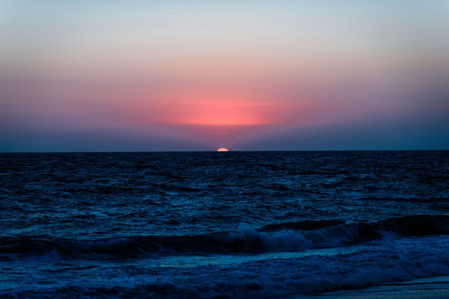 magical beach sunsets, purple, blue and pink hues