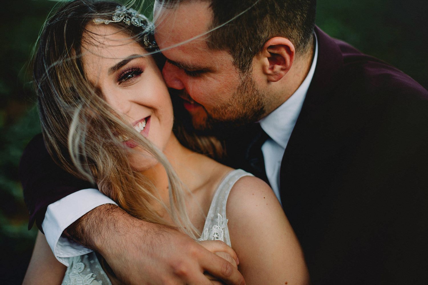 Vancouver Wedding Photographer About Chris Cassio LG Bride and Groom Hughs and smiling