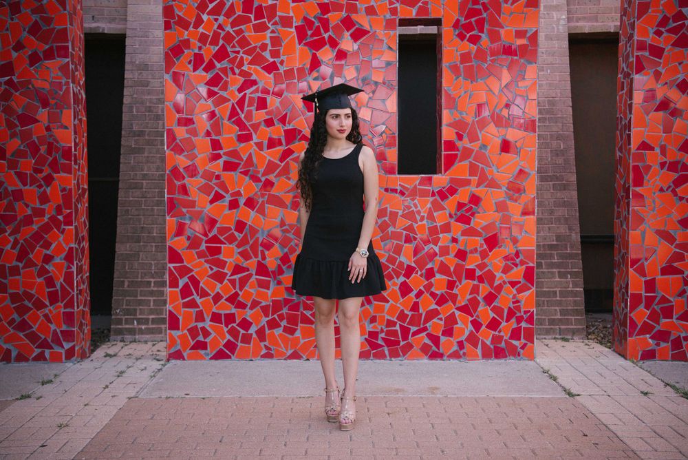 graduated girl looking away. UTRGV session. Edinburg, Texas. wedding photography
