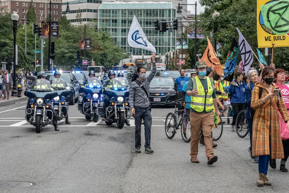 Extinction Rebellion Boston shuts down morning traffic and demands that Massachusetts ban new fossil fuel infrastructure