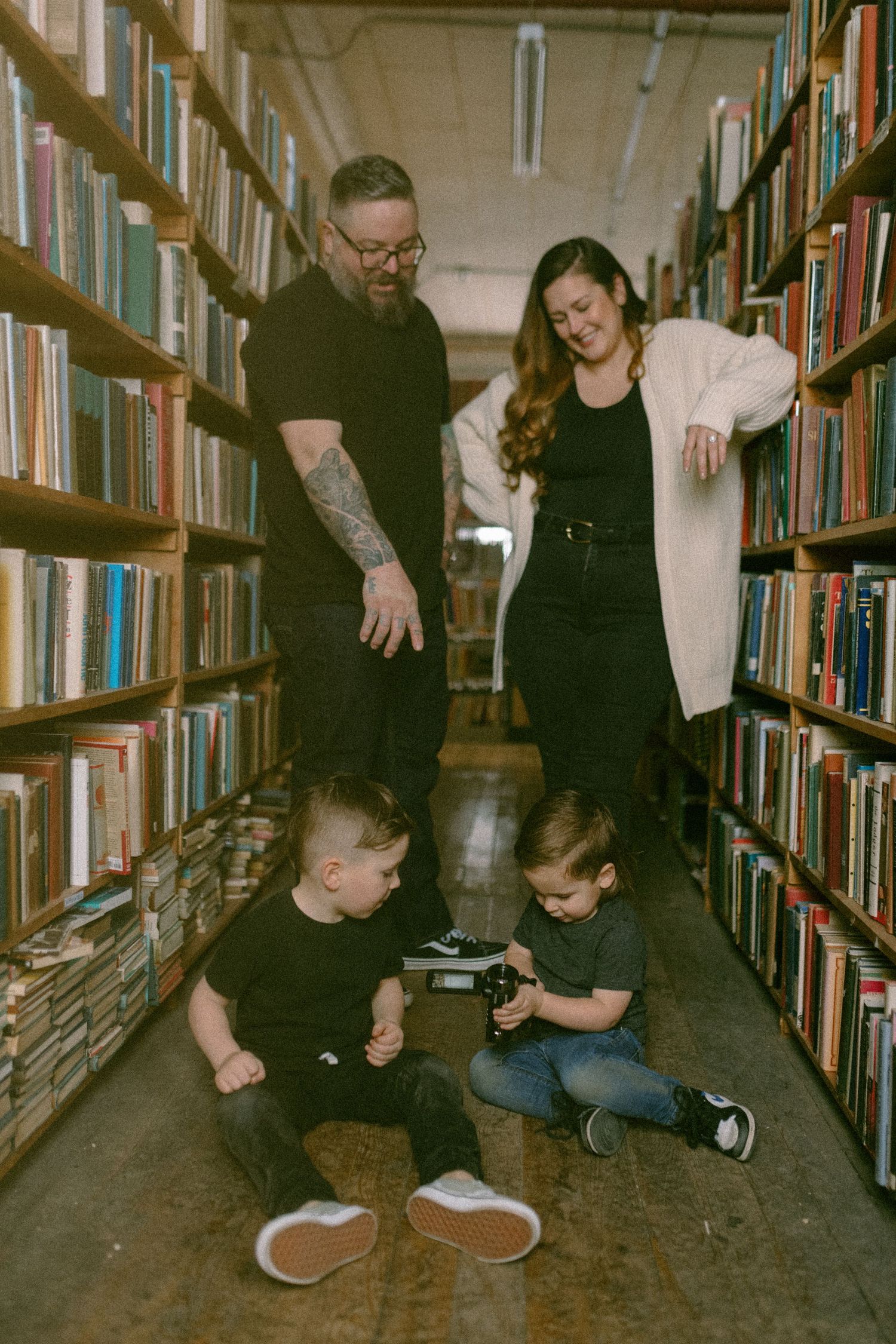 untraditional, unique family photos taken in a bookstore in downtown detroit