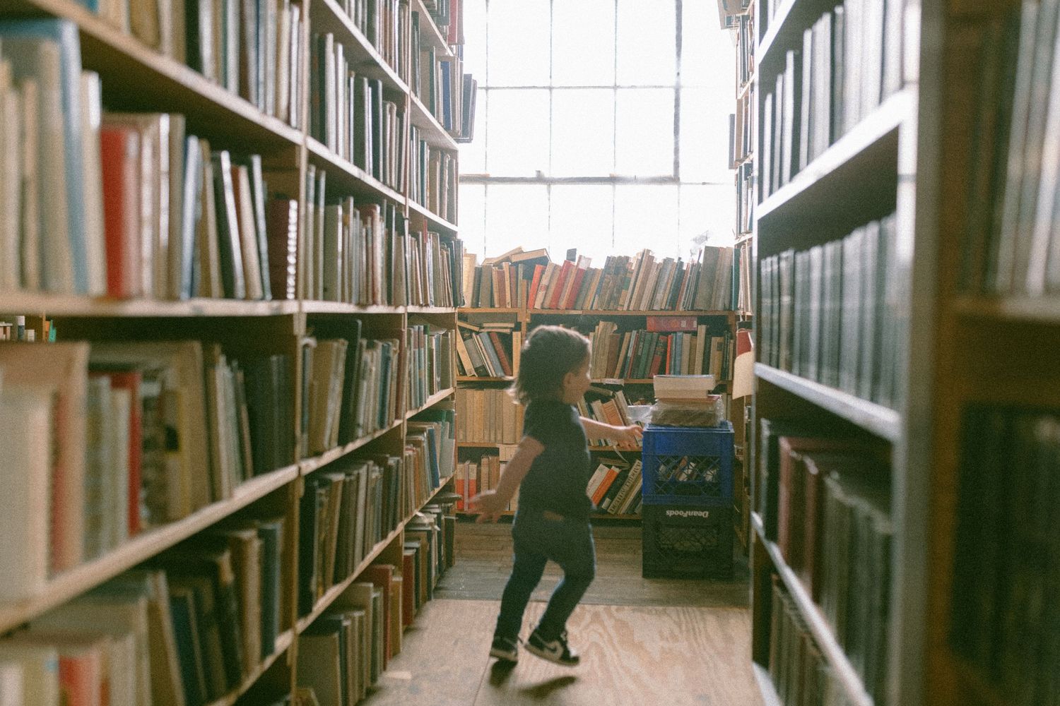 untraditional, unique family photos taken in a bookstore in downtown detroit