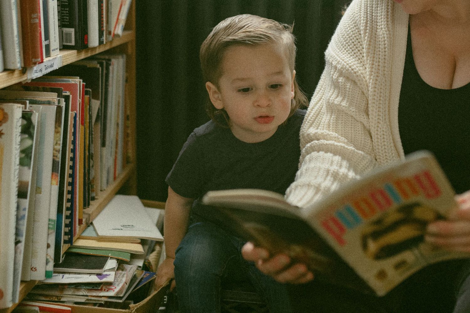 untraditional, unique family photos taken in a bookstore in downtown detroit