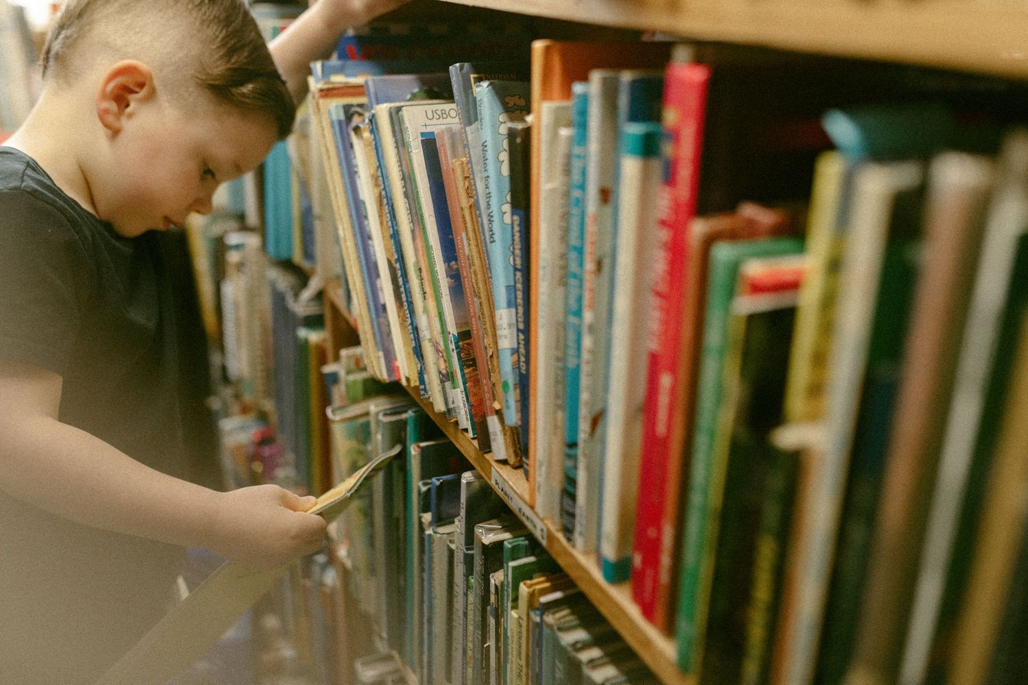 untraditional, unique family photos taken in a bookstore in downtown detroit