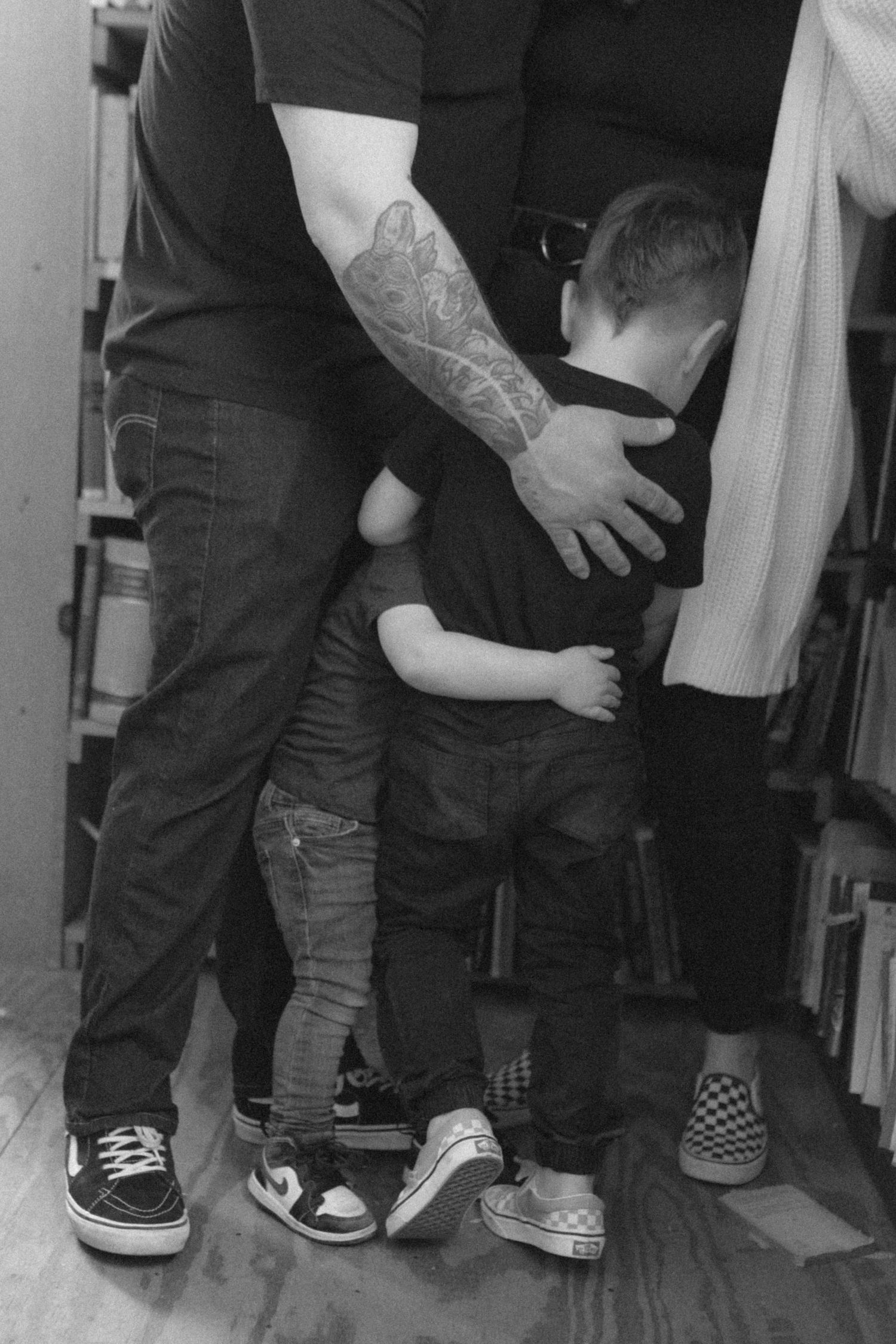 untraditional, unique family photos taken in a bookstore in downtown detroit