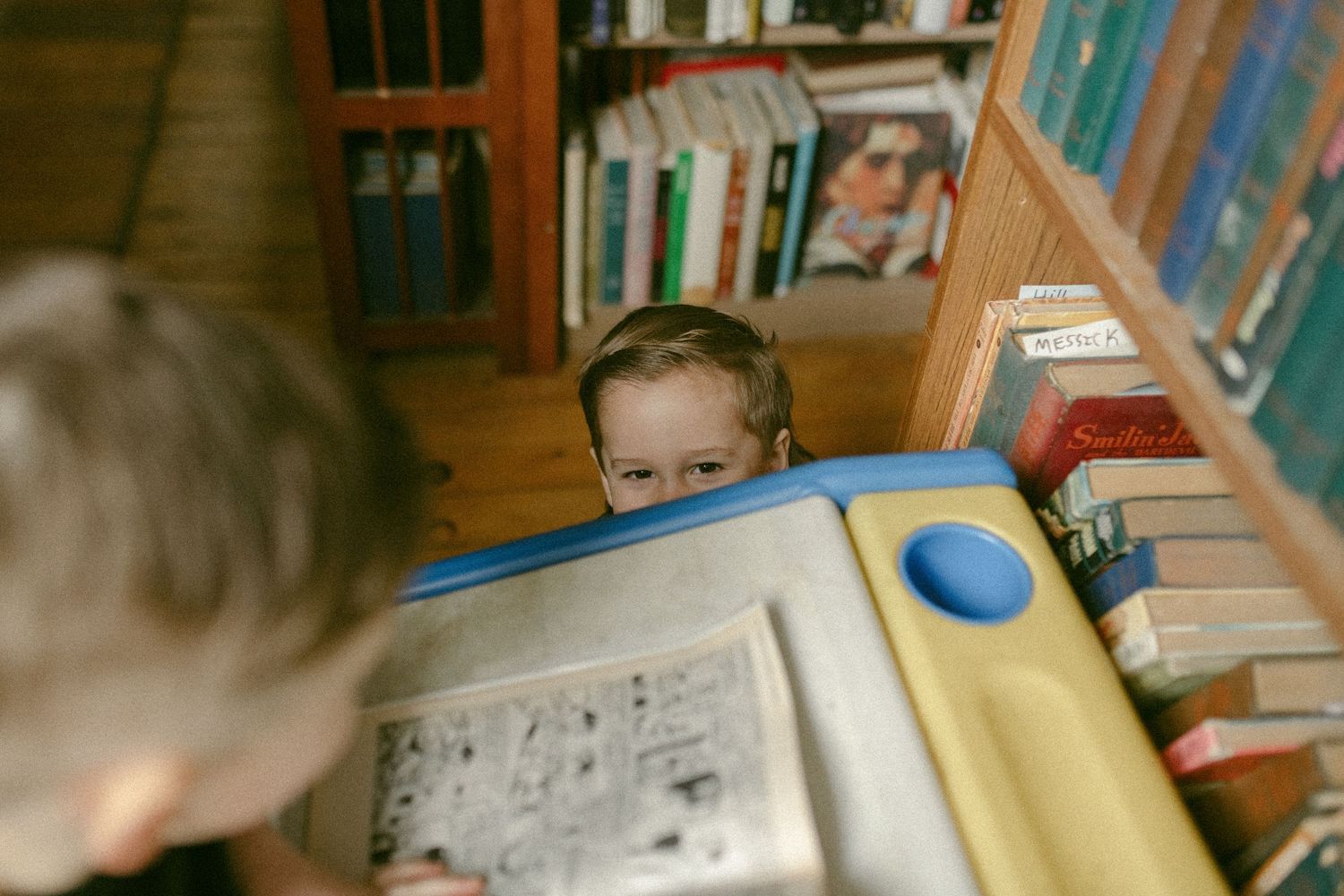 untraditional, unique family photos taken in a bookstore in downtown detroit