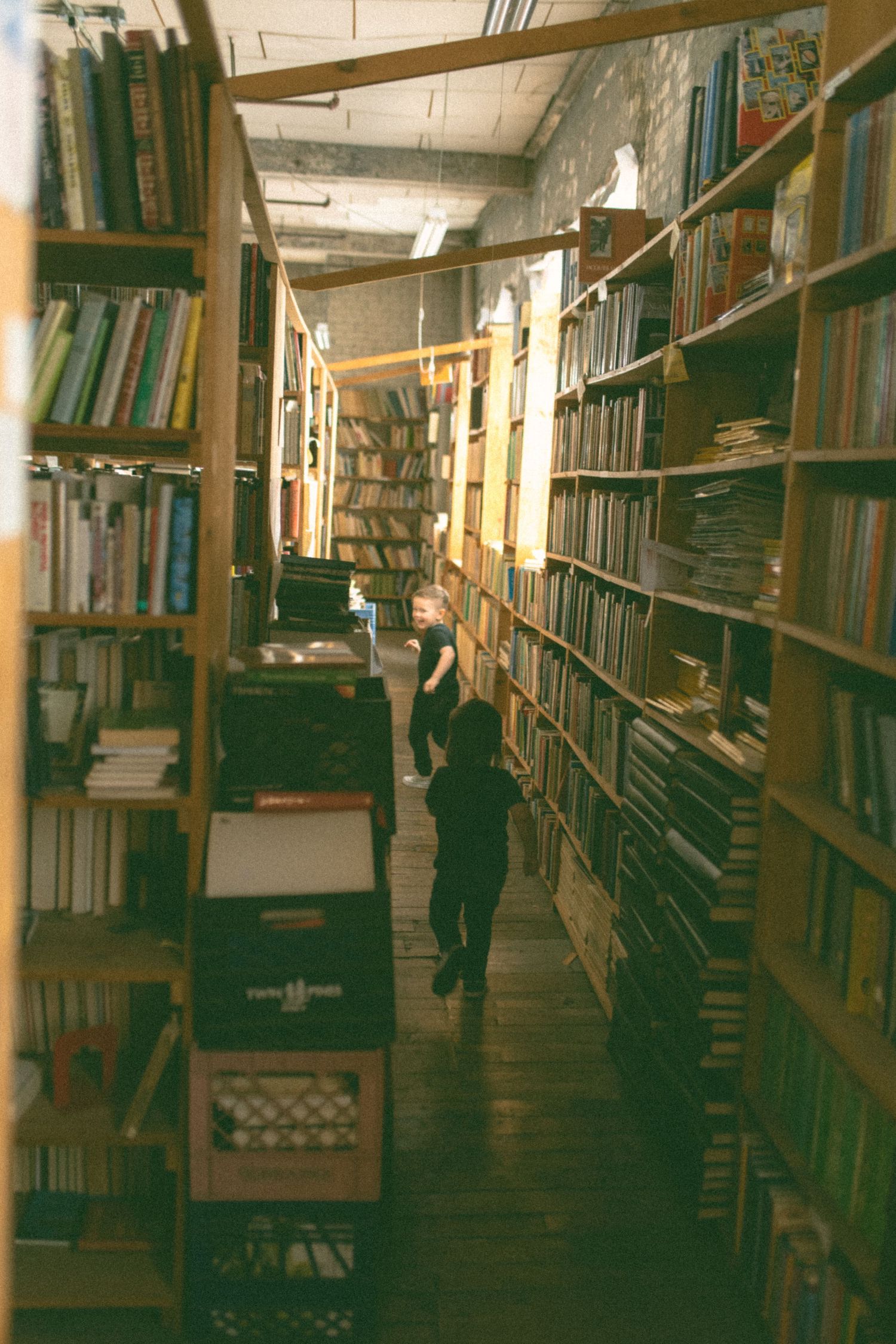 untraditional, unique family photos taken in a bookstore in downtown detroit