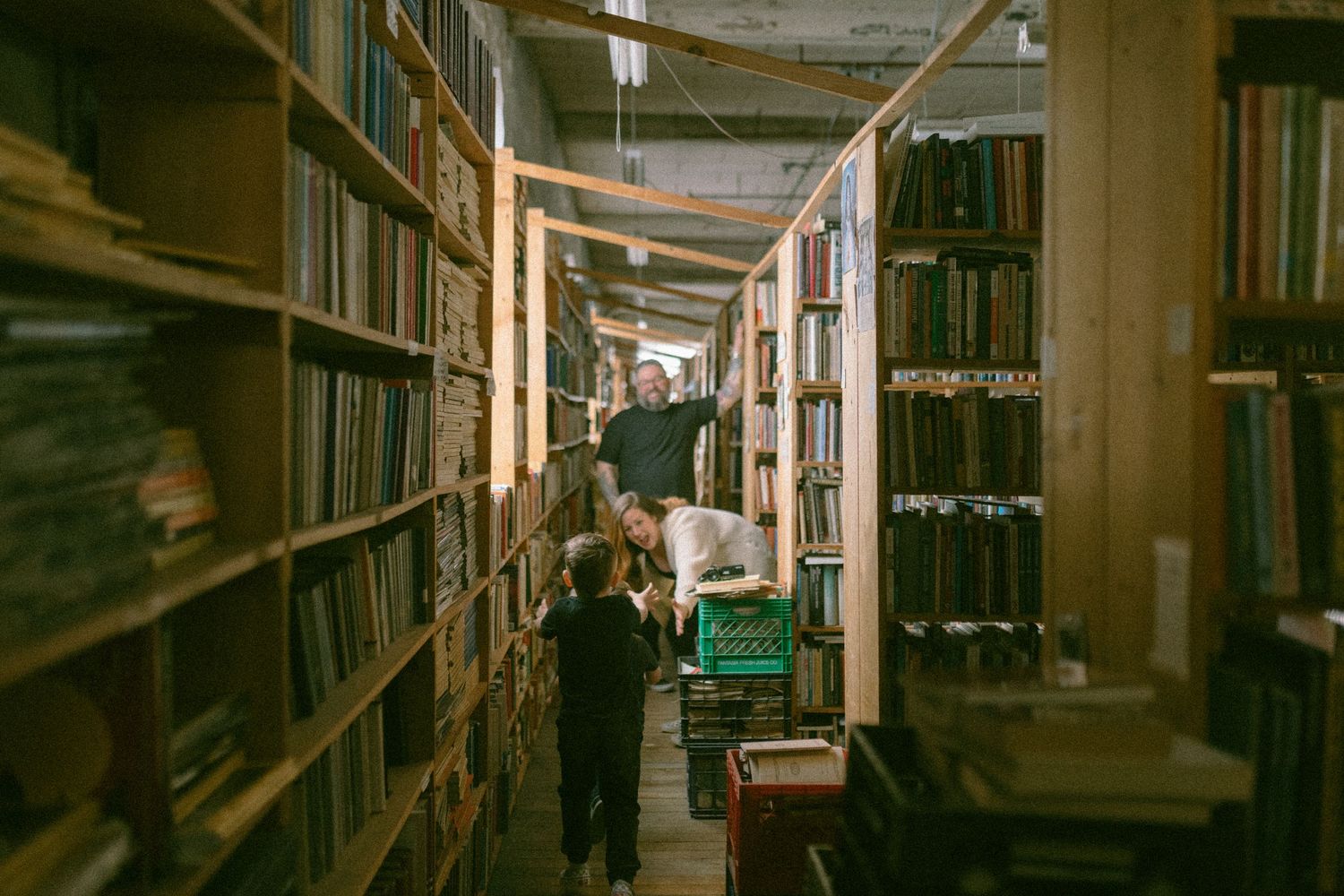 untraditional, unique family photos taken in a bookstore in downtown detroit