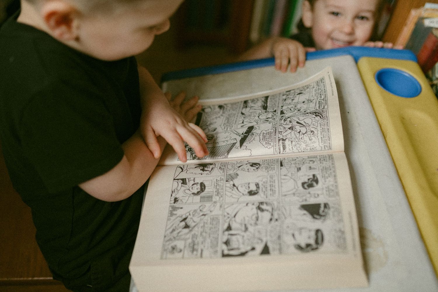 untraditional, unique family photos taken in a bookstore in downtown detroit