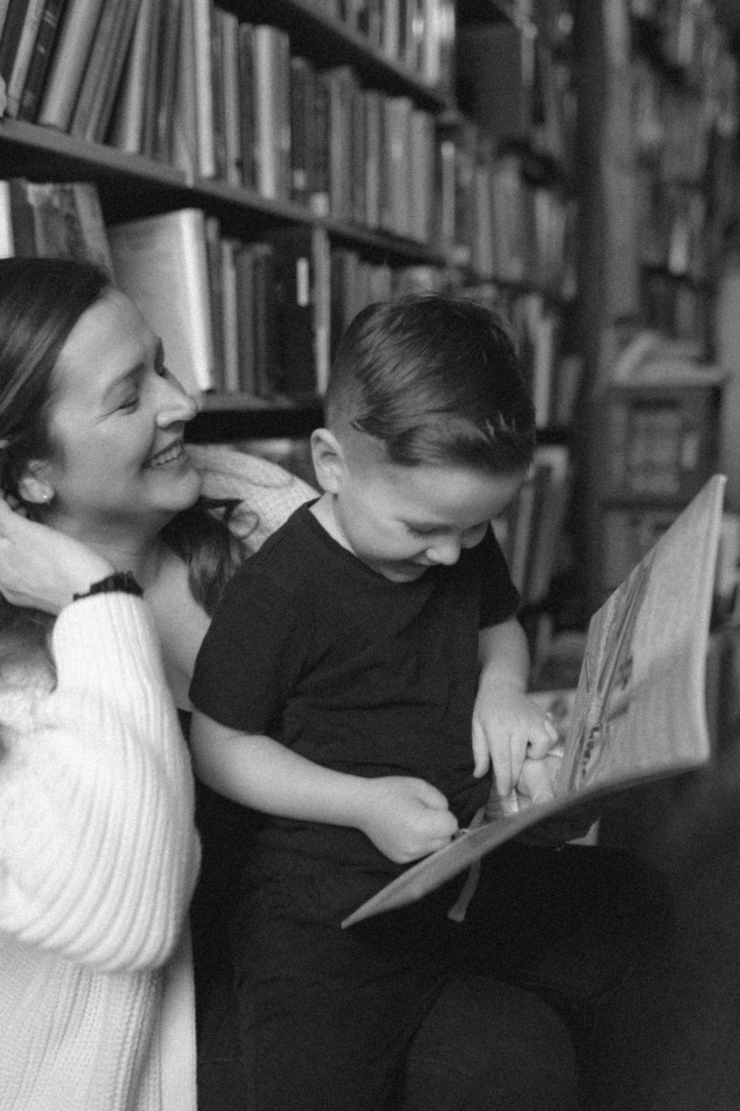 untraditional, unique family photos taken in a bookstore in downtown detroit