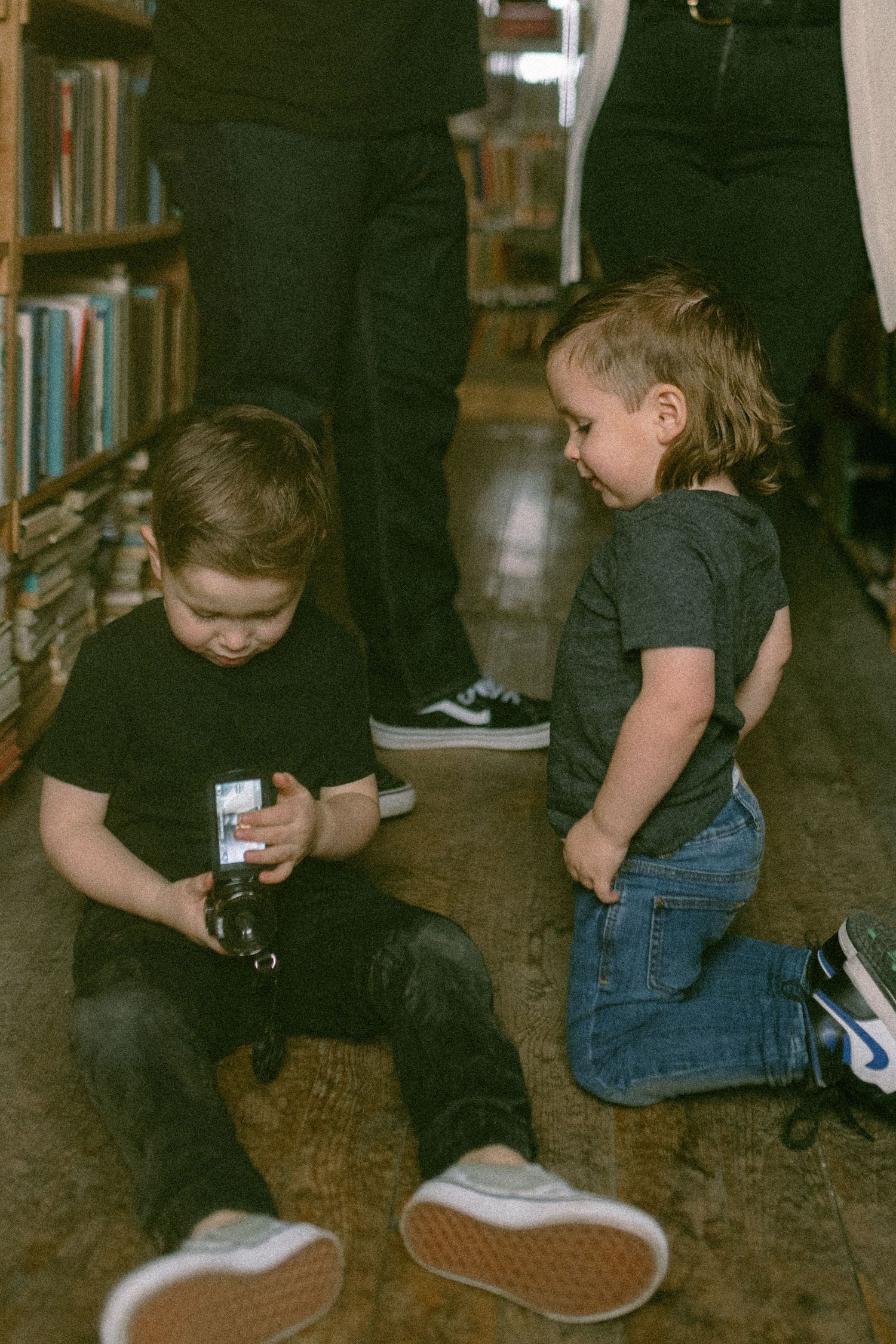 untraditional, unique family photos taken in a bookstore in downtown detroit