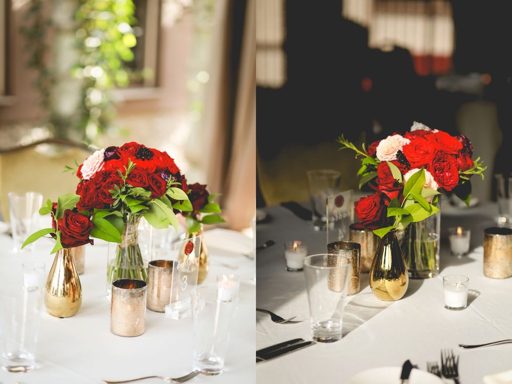 Red rose floral centerpieces in gold vases on white tablecloths at an elegant reception.
