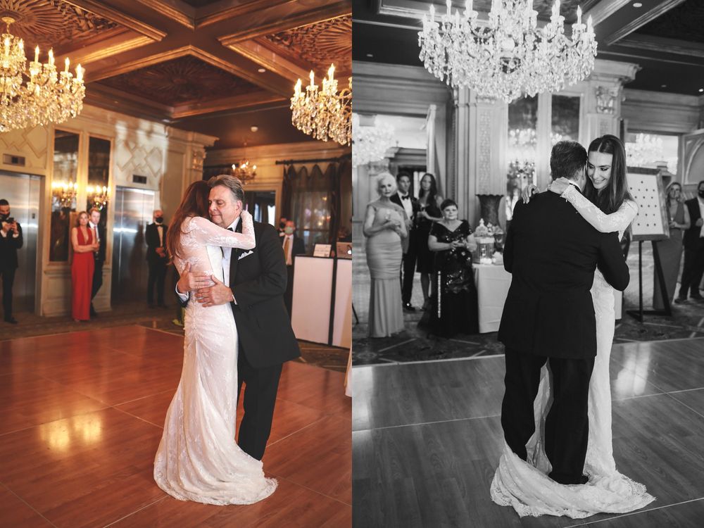 Couples dancing on a polished wooden floor beneath ornate chandeliers at an elegant wedding reception.