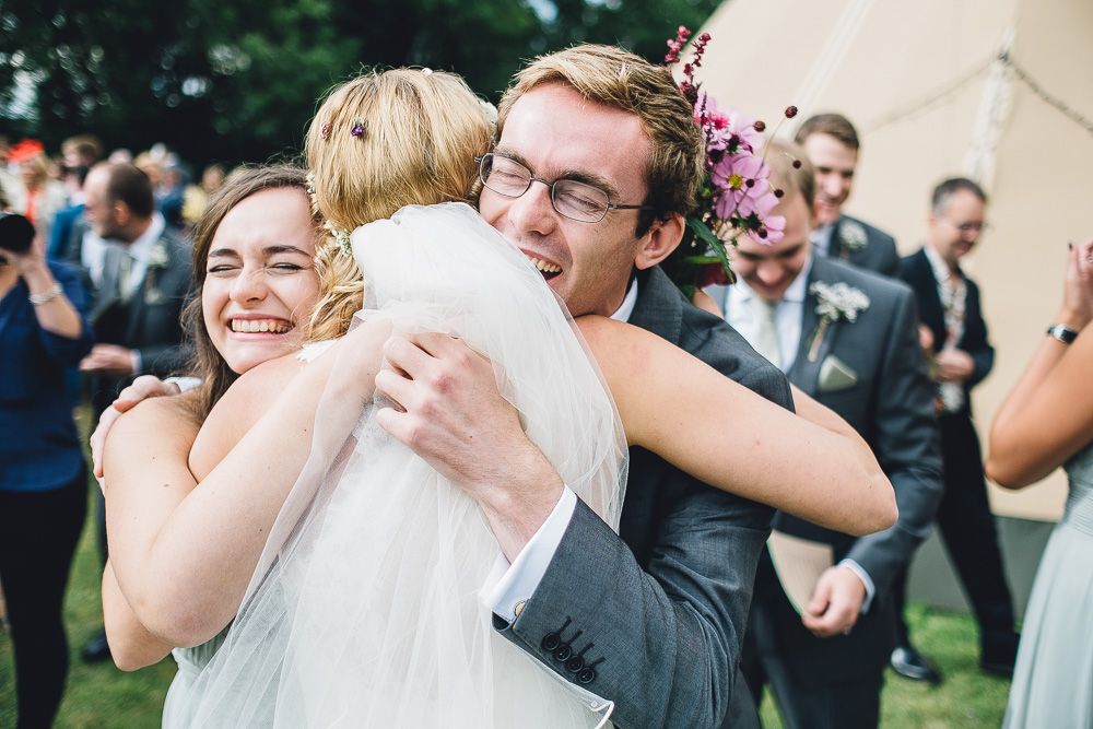 wedding hugs with bride